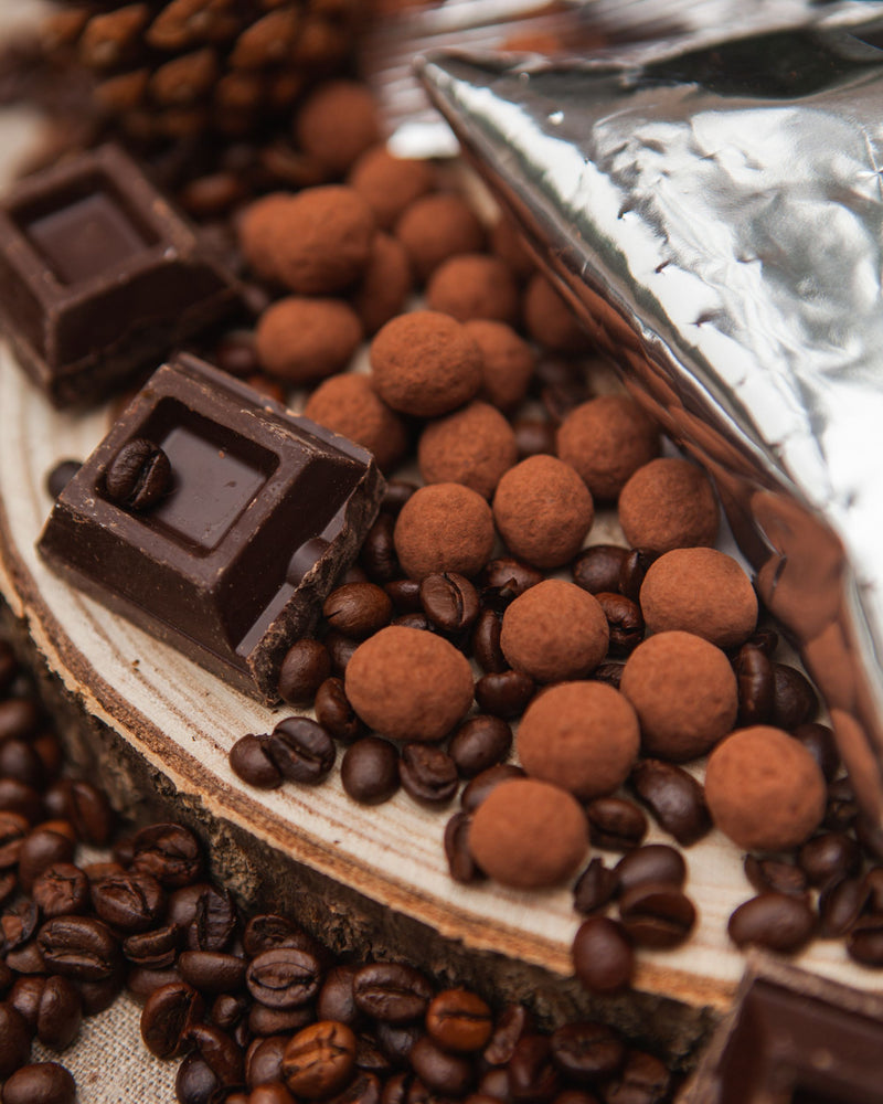 Caffè ricoperto con il 64% di Cioccolato Fondente per ottenere dei dragées perfetti da regalare